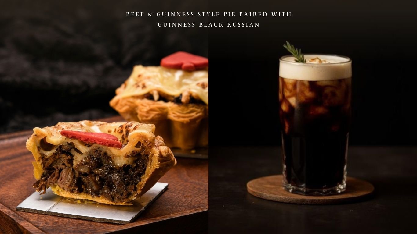 Beef and Guinness-style pie served with a Guinness Black Russian cocktail on a wooden table.