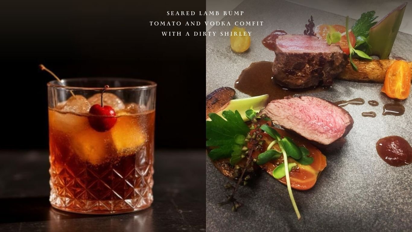 Dirty Shirley cocktail with cherry garnish paired with seared lamb rump and tomato vodka confit.